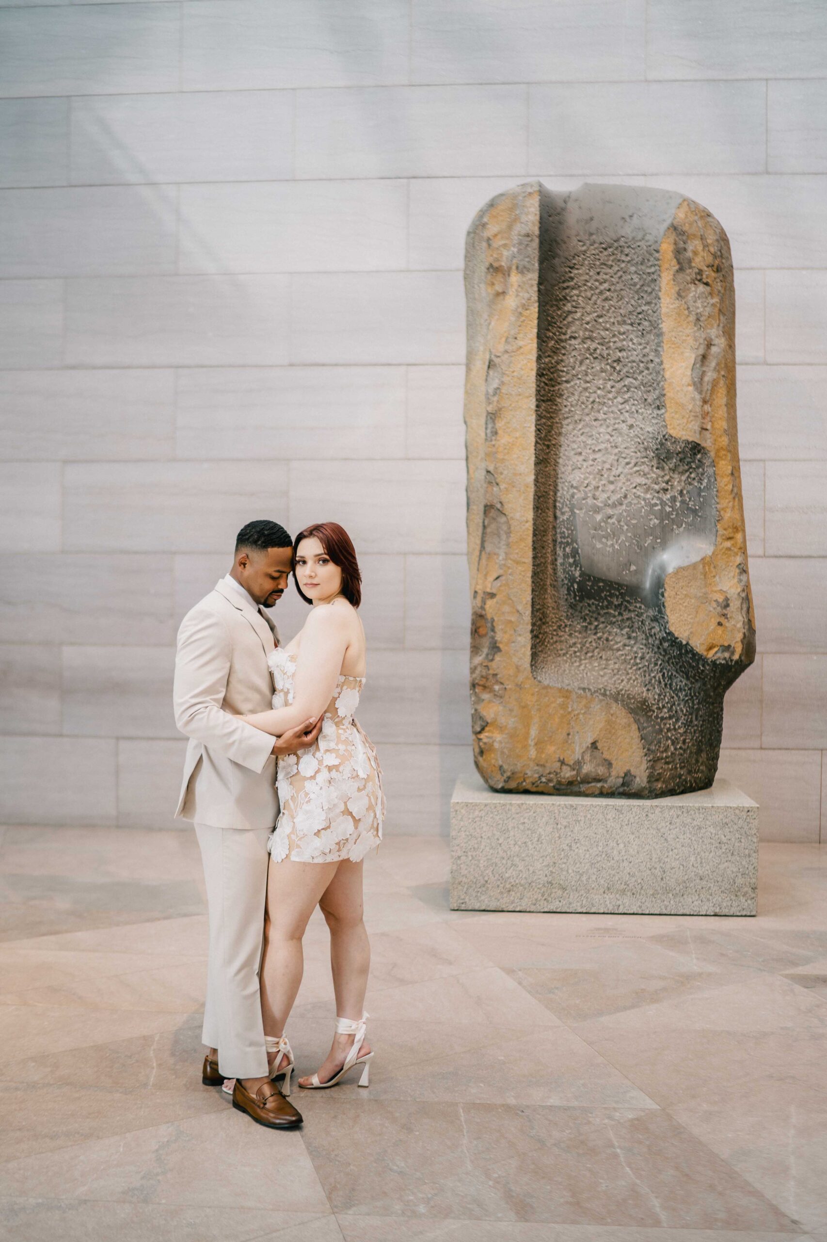 bride and groom stand by each other national gallery of art wedding portrait