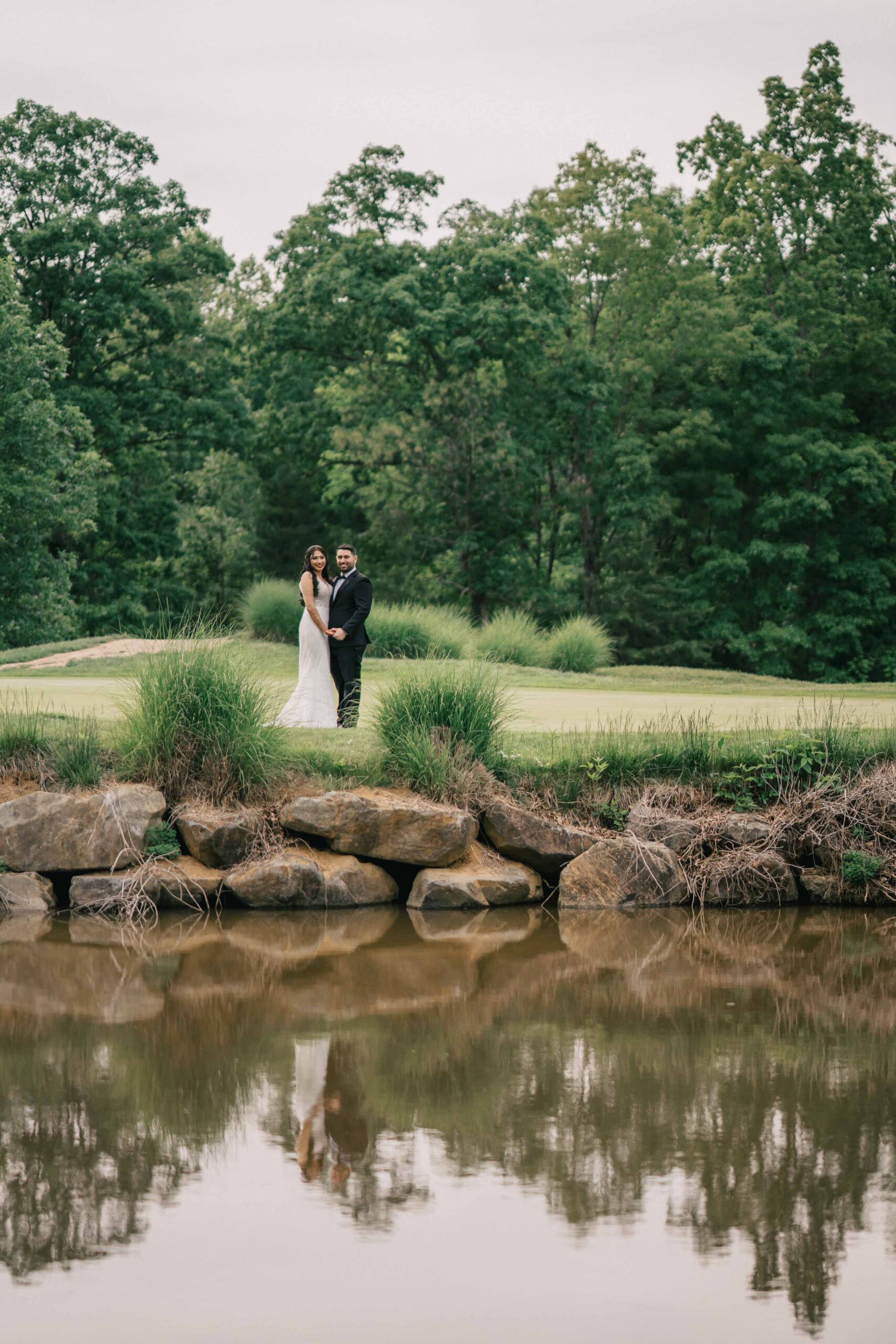 west fields couple portrait by the water with their shadow