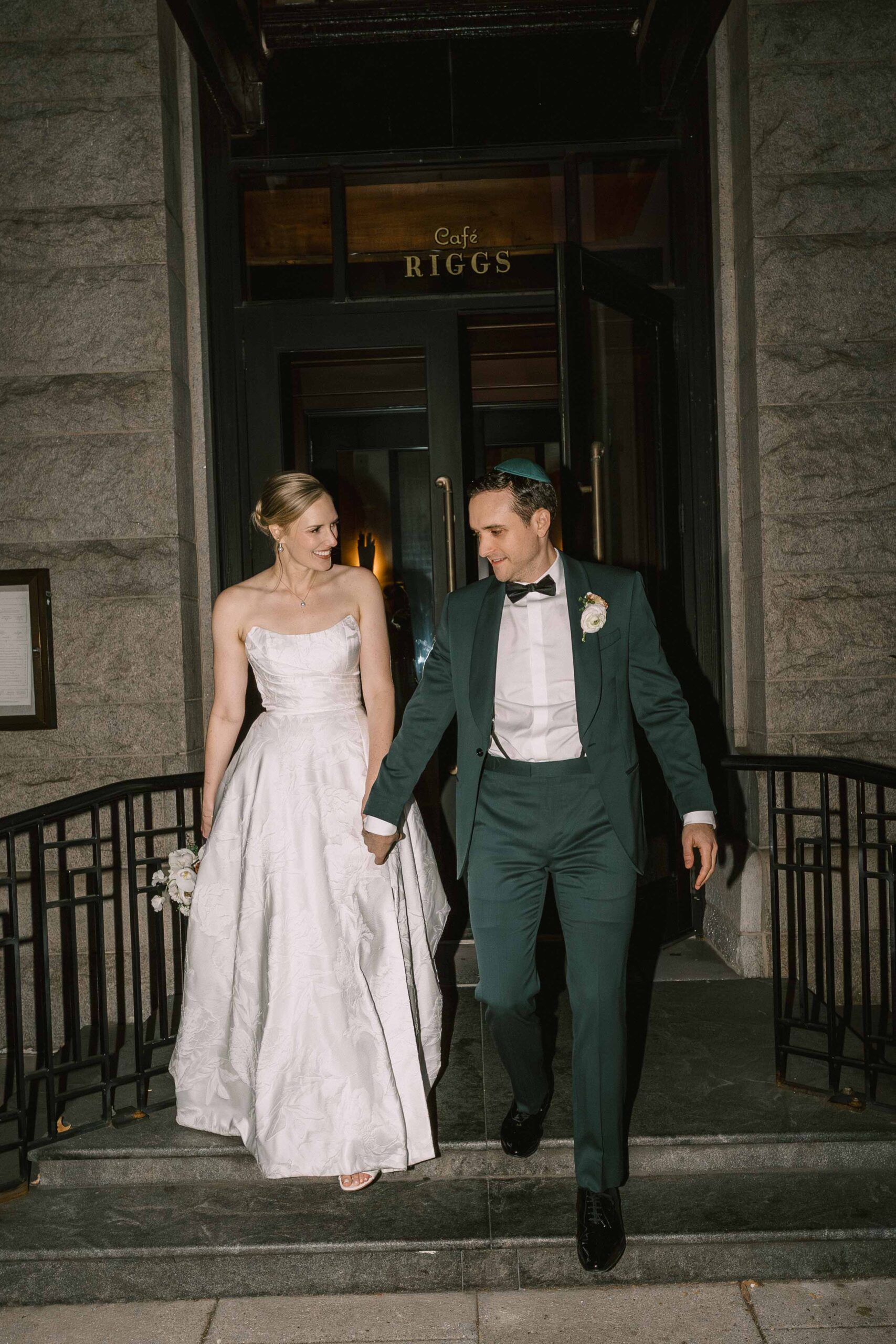 Riggs Hotel Wedding couple walking out of the Riggs front door